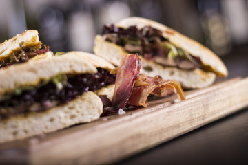 Close up of delicious sandwiches.  Beautifully served meal at the restaurant.