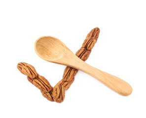 Yes tick made of pecan nuts isolated