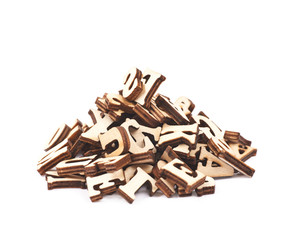 Pile of wood carved letters isolated