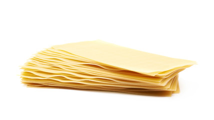 Pile of dried lasagna sheets isolated