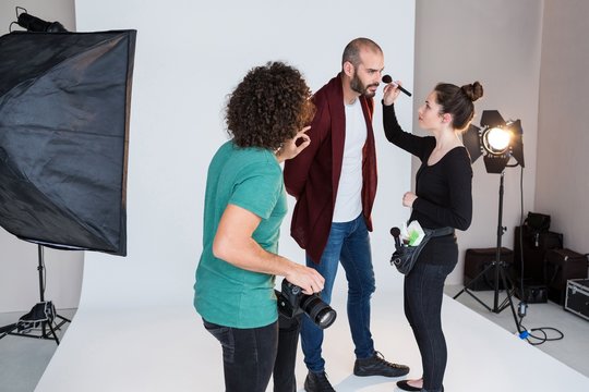 Male model preparing for a photo shoot