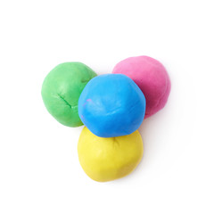Pile of colorful plasticine balls isolated