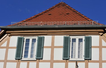 Renovated House-Front with Dormer Windows (Gauben) at tiled Roof (Ziegeldach)