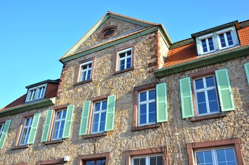 Renovated House-Front with Dormer Windows (Gauben) at tiled Roof (Ziegeldach)