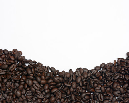 Roasted Coffee Beans on White background with copy space