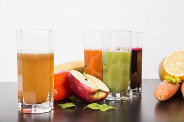 juicing fresh beautiful bright vegetables and fruits