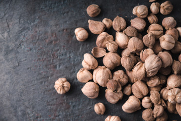 Placer white cardamom on a gray slate close-up