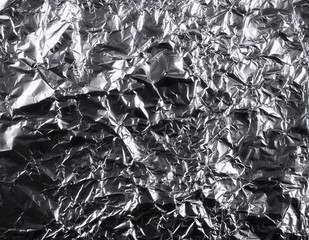 crumpled silver aluminum foil background, abstract texture