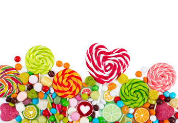 Colorful candies and lollipops. Top view.