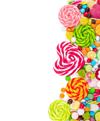 Colorful candies and lollipops. Top view.