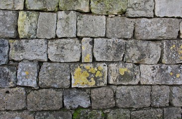 Texture of the stone wall. Dark granite as modern grunge design.