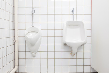 urinal on the wall