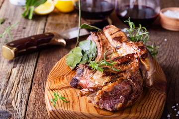 Barbecue bone ribeye steak on wooden board