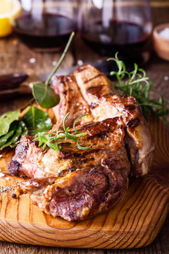 Barbecue bone ribeye steak on wooden board