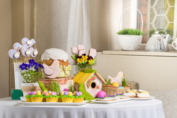 easter  cupcakes sweet rabbit eggs and flowers still life
