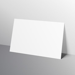 Fototapeta premium white horizontal a4 size paper mockup template leaned towards wa
