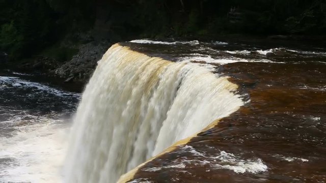 Seamless loop features Upper Tahquamenon Falls in Michigan's Upper Peninsula. This is the second  largest waterfall in the USA east of the Mississippi River.