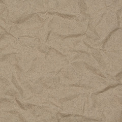 abstract background of crumpled kraft paper with blotches