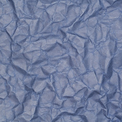 abstract background of crumpled blue paper