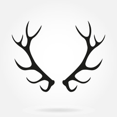 Deer antlers. Horns icon isolated on white background. Vector black silhouette.