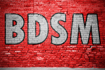 BDSM Ziegelsteinmauer Graffiti