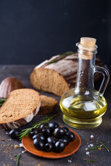 Fresh ciabatta with olive oil and olives