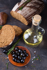 Fresh ciabatta with olive oil and olives