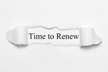 Time to Renew on white torn paper