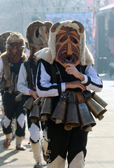 Pernik, Bulgaria - January 28, 2017: Masquerade festival Surva in Pernik, Bulgaria. People with mask called Kukeri dance and perform to scare the evil spirits
