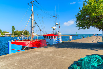 Traditional fishing boats anchoring in Jastarnia port on sunny summer day, Hel peninsula, Baltic Sea, Poland