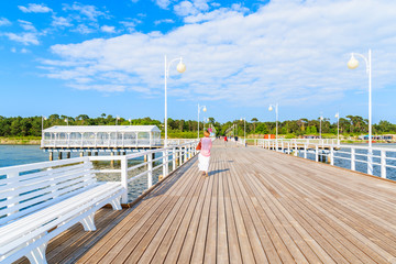 View of Jurata pier in sunny summer day, Baltic Sea, Poland - obrazy, fototapety, plakaty