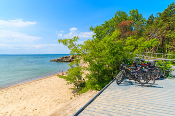 Bicycles on coastal promenade along beach in Hel town, Baltic Sea, Poland