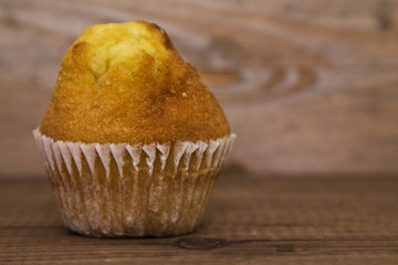 sweet cupcakes on wood