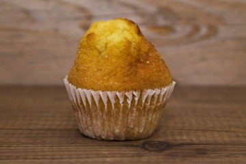 sweet cupcakes on wood
