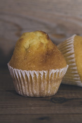 sweet cupcakes on wood