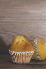sweet cupcakes on wood