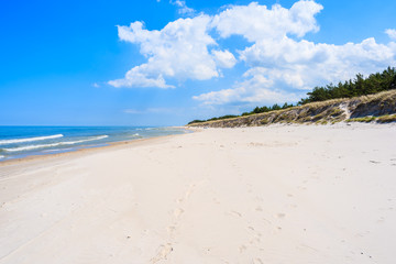 View of white sand beach in Lubiatowo, Baltic Sea, Poland