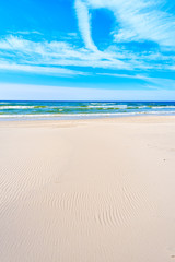 Fototapeta na wymiar White sand and beautiful sea on Debki beach, Baltic Sea, Poland