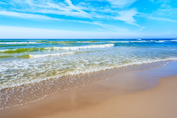 Fototapeta na wymiar Beautiful sea waves on Debki beach, Baltic Sea, Poland