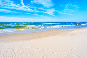 Fototapeta na wymiar White sand and beautiful sea on Debki beach, Baltic Sea, Poland