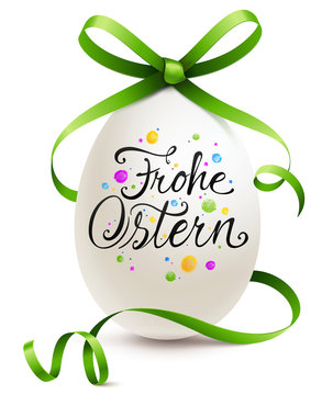 Buntes Osterei mit grüner Kringel Schleife und Kalligraphie - Frohe Ostern