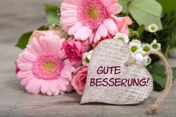 Obraz na płótnie Canvas Blumen und Herz: Gute Besserung!