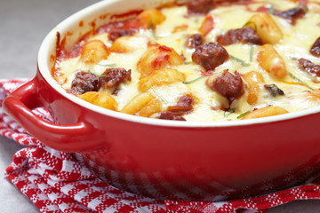 Homemade gnocchi with sausage and sauce