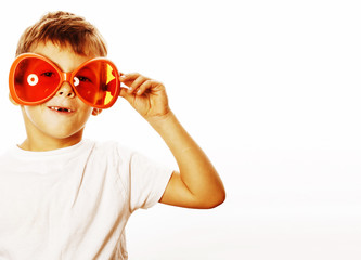 little cute boy in orange sunglasses pointing isolated close up 