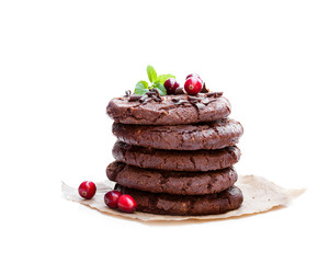 stack  of dark chocolate cookies with cranberry isolated on whit