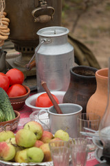 Vintage Cutlery. Samovar. Lunch in the field. Apples. Tomatoes. Aluminum utensils.
