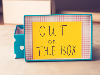 Think out of box creativity concept yellow card