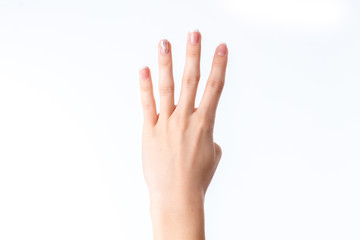 female hand showing four fingers