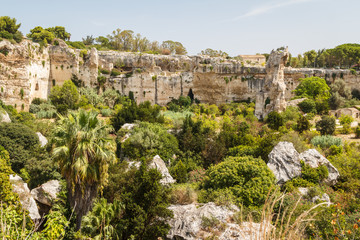 A view over old rock necropolis in Syracuse, Sicily island, Ital