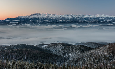 Beautiful winter panorama over Spisz highland to snowy Tatra mountains in the morning, Poland